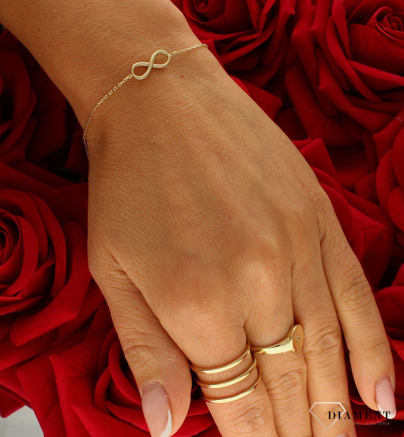 Złota bransoletka damska 375 celebrytka ze znakiem nieskończoności BR 2246C 375. Złota bransoletka damska. Złota bransoletka próby 375. Bransoletka złota damska delikatna celebrytka. Bransoletka złota celebrytka ideal.jpg